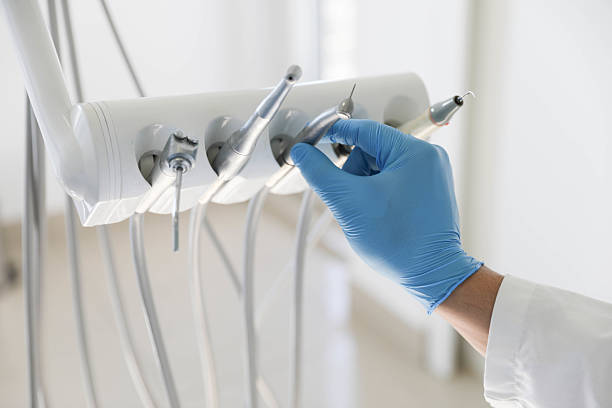 Professional Tooth Extraction technician working in Farmer City, IL